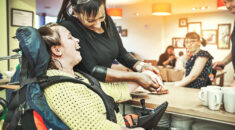 Community support worker with a wheelchair user