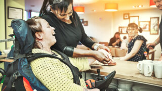 Community support worker with a wheelchair user