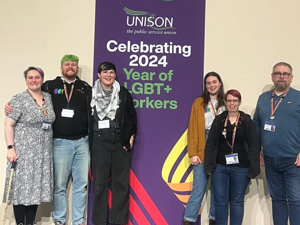 Cas Metcalf with UNISON Cymru members at LGBT+ conference, 2024